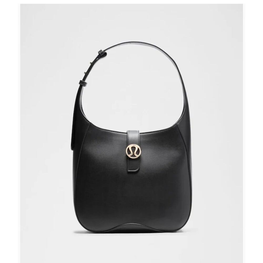 Lululemon Leather Alternative Shoulder Bag in Black/Gold
